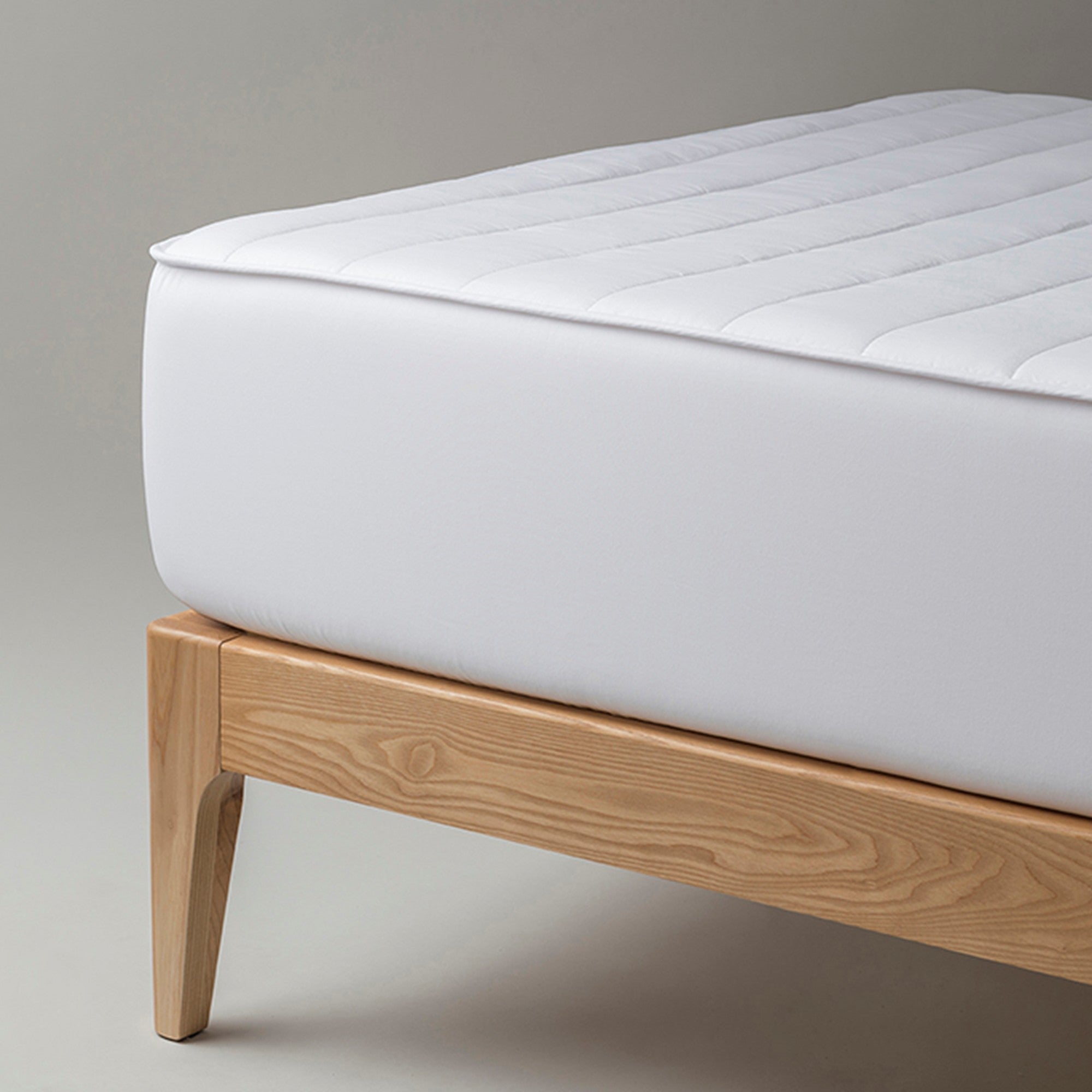 Motion Reversible Quilted Mattress Protector in White
